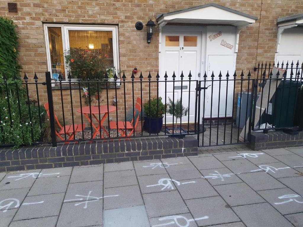 a wrought iron fence in front of a house at Anerley-Crystal Palace in Sydenham
