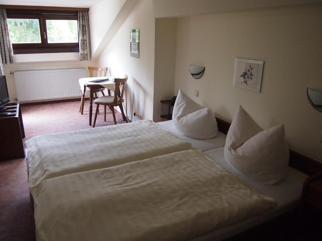 Postel nebo postele na pokoji v ubytování Hotel Köppeleck