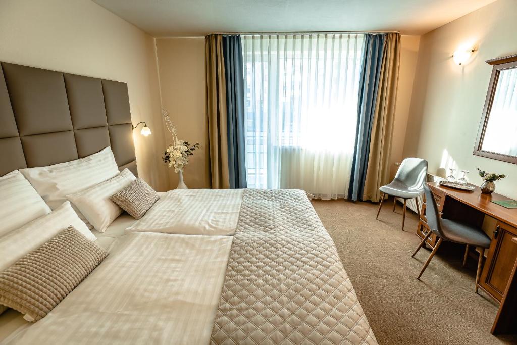 Postel nebo postele na pokoji v ubytování Dixon Resort