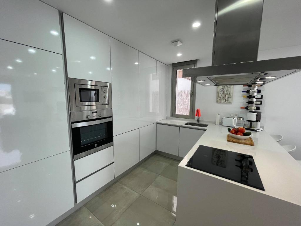 A kitchen or kitchenette at Casa Mordi