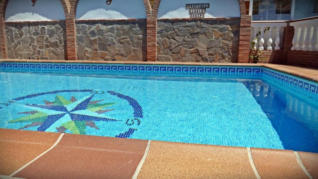 The swimming pool at or close to Castillo de la Hazalara