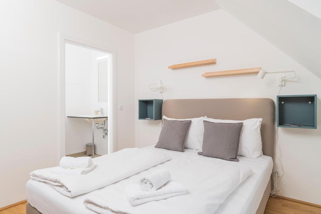 Posteľ alebo postele v izbe v ubytovaní Micro Rooftop Penzing