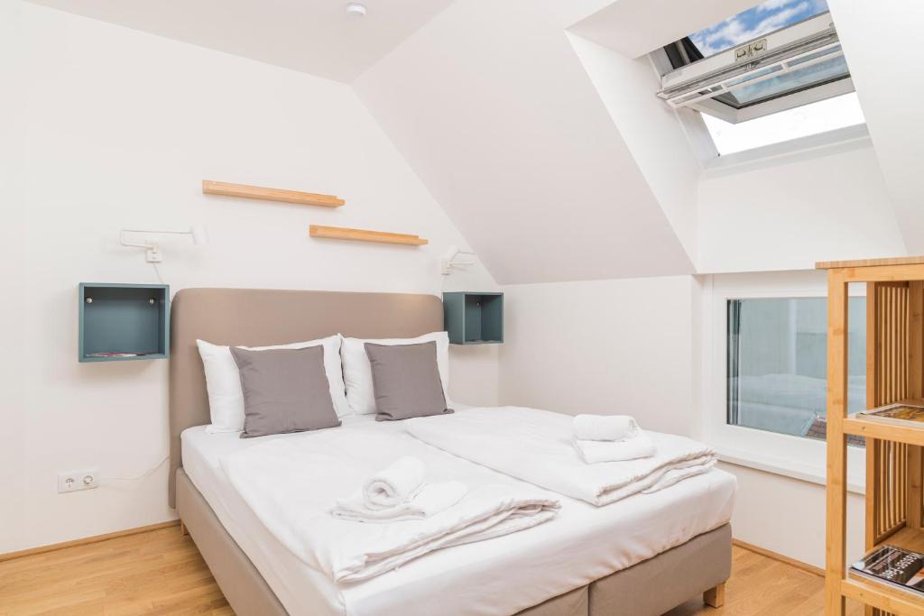 Posteľ alebo postele v izbe v ubytovaní Micro Rooftop Penzing
