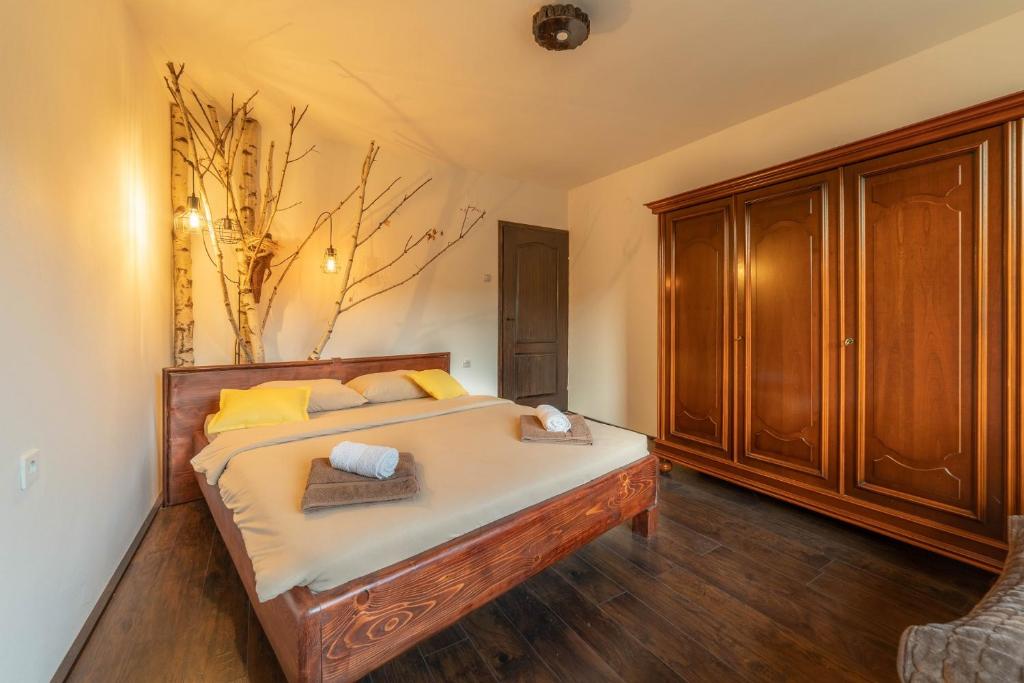 Postel nebo postele na pokoji v ubytování Apartments Vidik