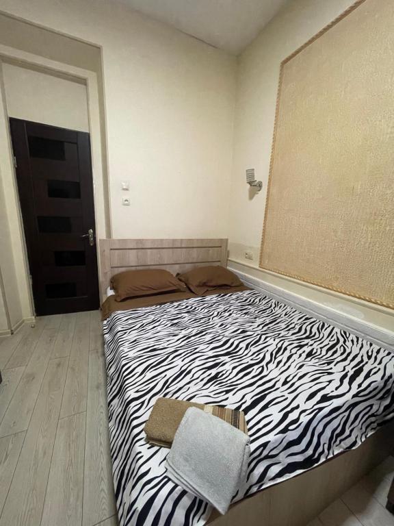 Postel nebo postele na pokoji v ubytování Fazis Hotel