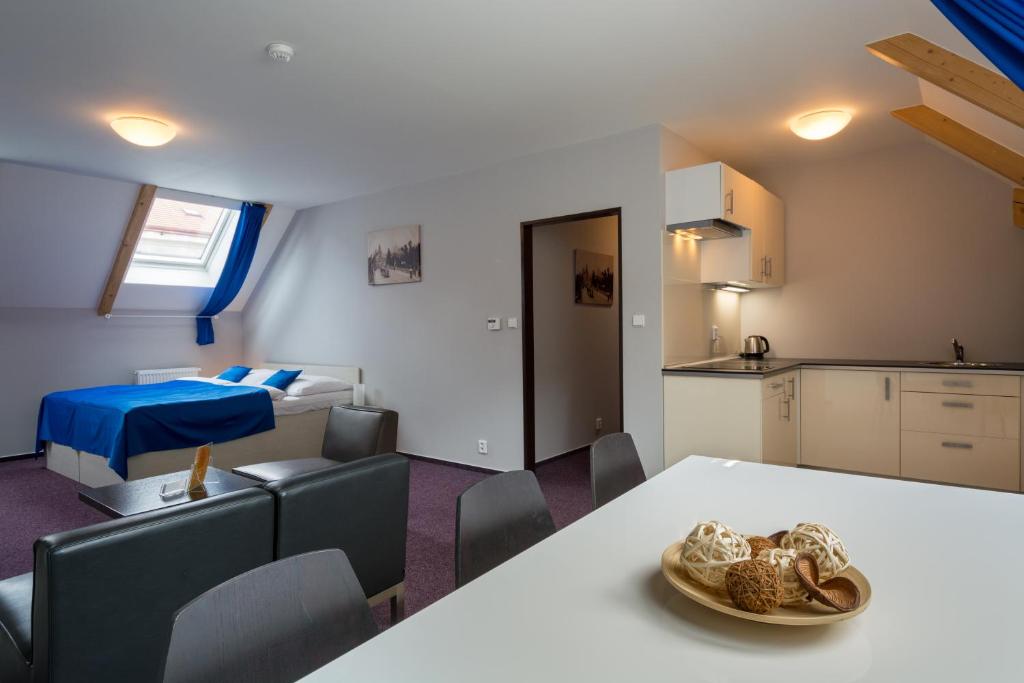 Llit o llits en una habitació de Adeba Hotel