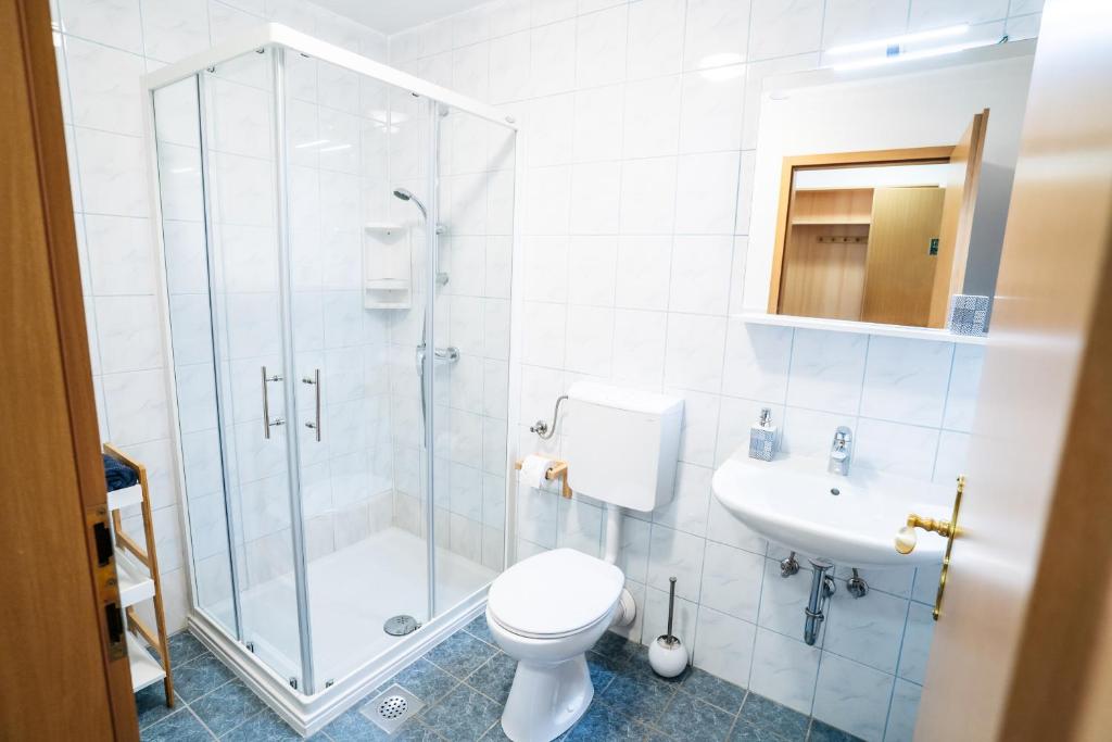 Koupelna v ubytování Apartmaji Alpski cvet - Hiša Gorenc