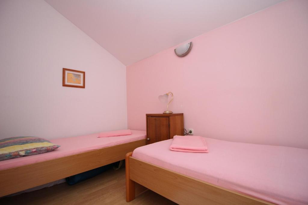 Postel nebo postele na pokoji v ubytování Holiday Home Gea