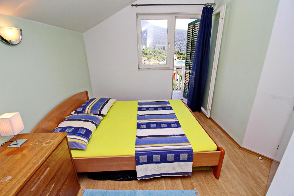 Postel nebo postele na pokoji v ubytování Holiday Home Gea