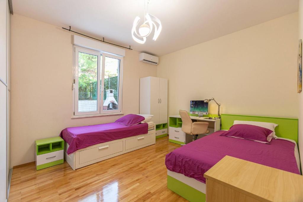 Posteľ alebo postele v izbe v ubytovaní Apartment Relax whit big terrace 170m2 Near the best Beach in City