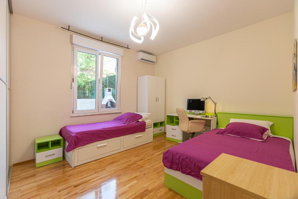 Posteľ alebo postele v izbe v ubytovaní Apartment Relax whit big terrace 170m2 Near the best Beach in City
