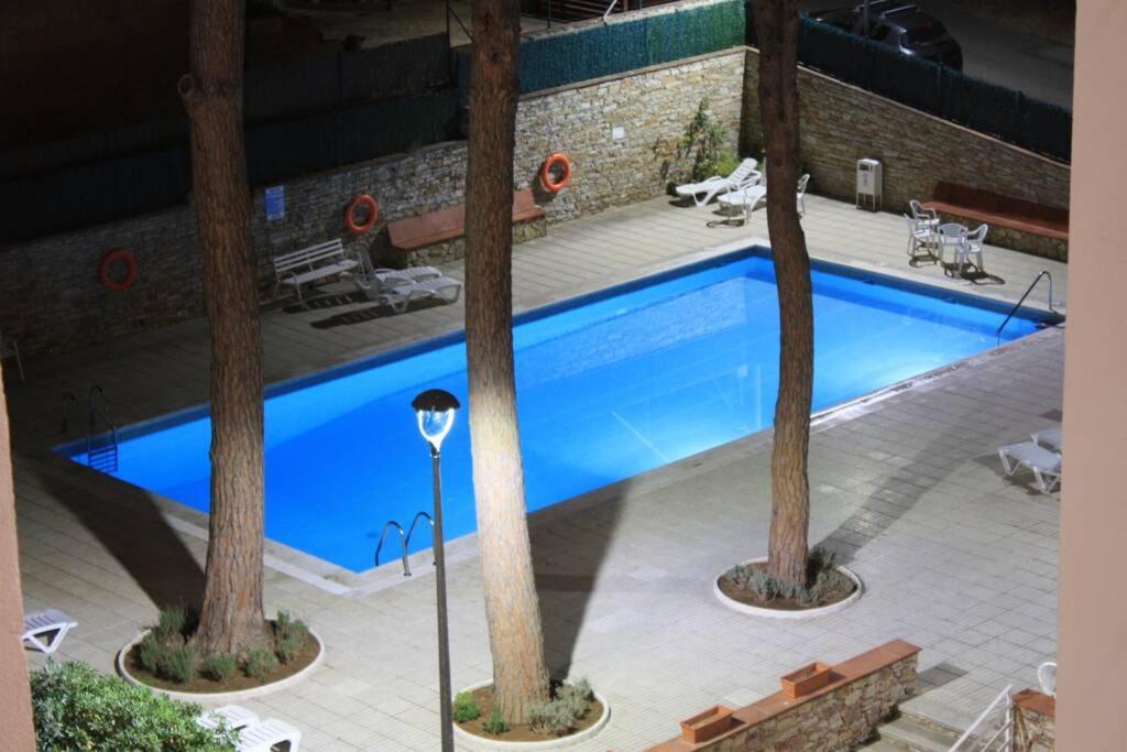 Bazén v ubytování Precioso apartamento con piscina. nebo v jeho okolí