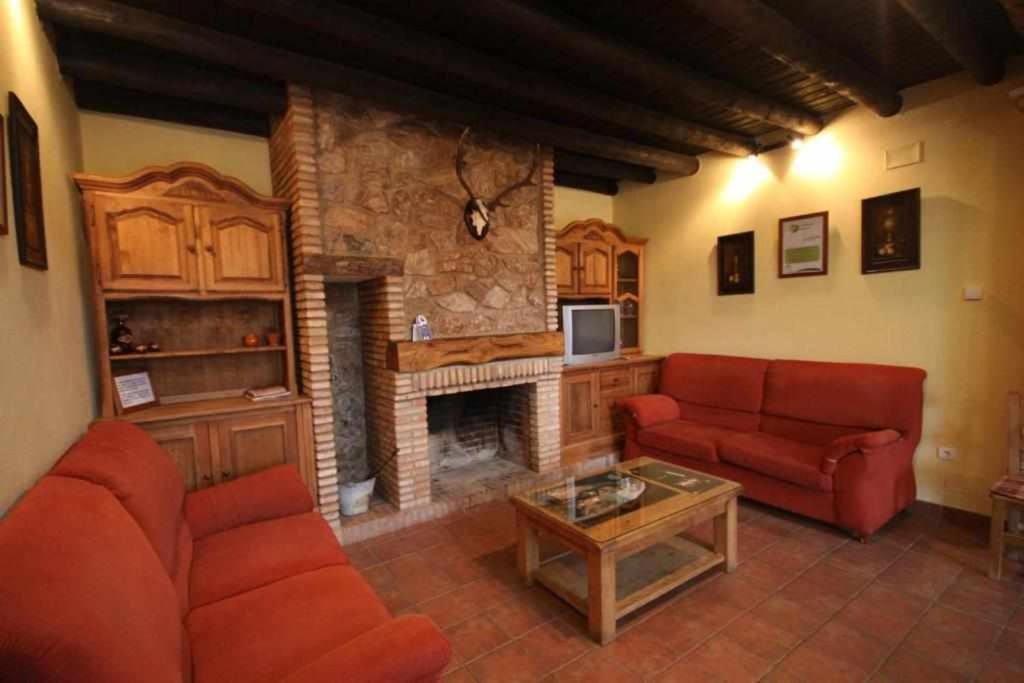 Część wypoczynkowa w obiekcie Casa Rural Finca El Tornero