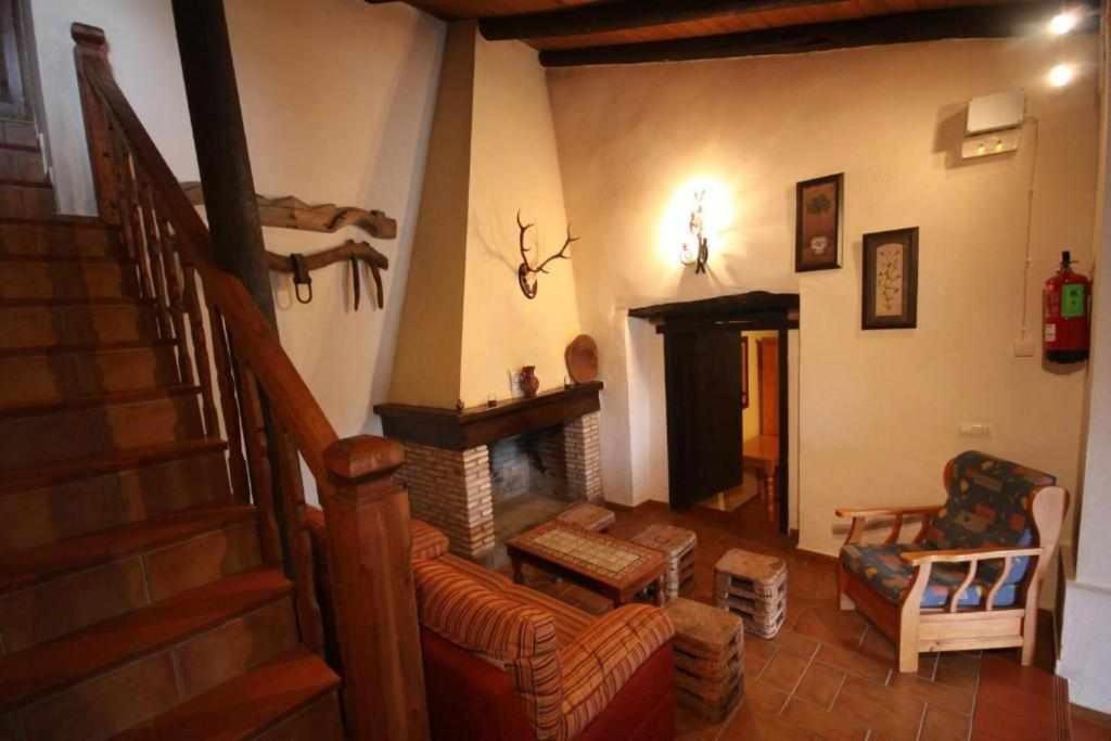 Część wypoczynkowa w obiekcie Casa Rural Finca El Tornero