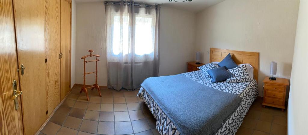 Łóżko lub łóżka w pokoju w obiekcie Sierra Norte