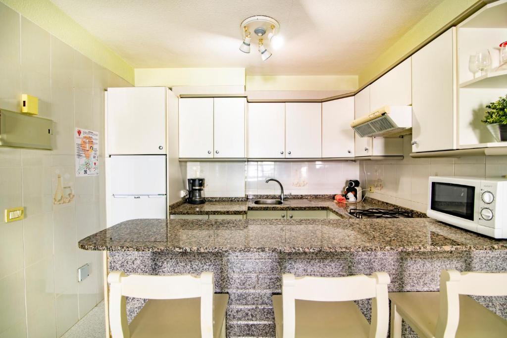 Kuchyň nebo kuchyňský kout v ubytování Alquilaencanarias- Medano Apartment Bogavante