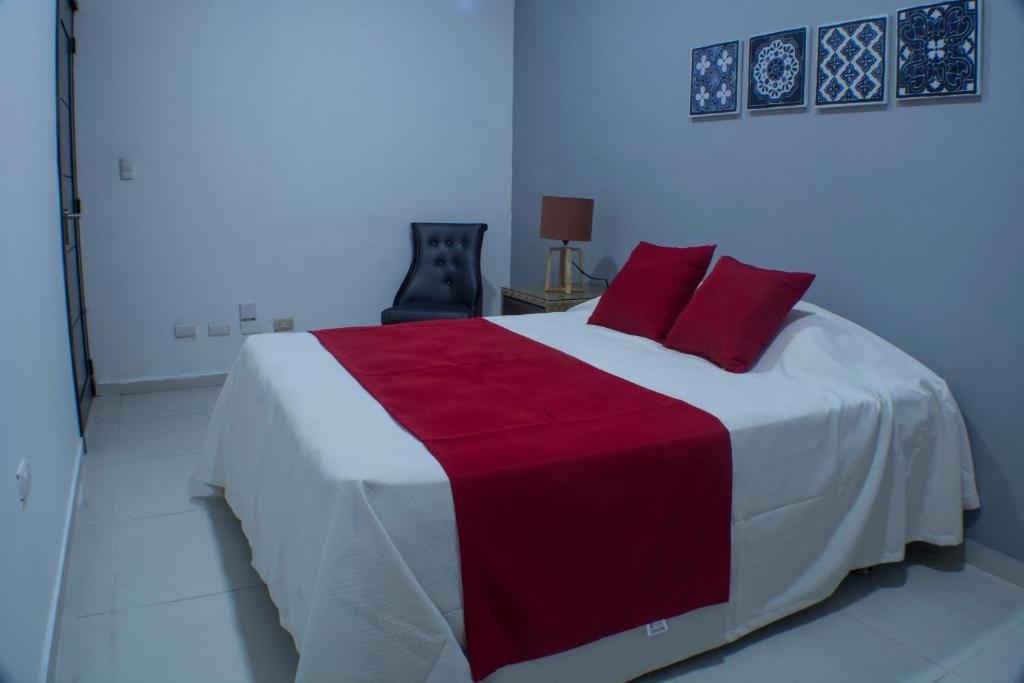 Postel nebo postele na pokoji v ubytování Malecon Premium Rooms & Hotel