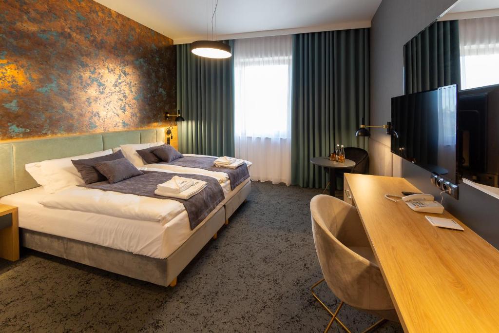 TV a/nebo společenská místnost v ubytování Hotel & SPA Hetman