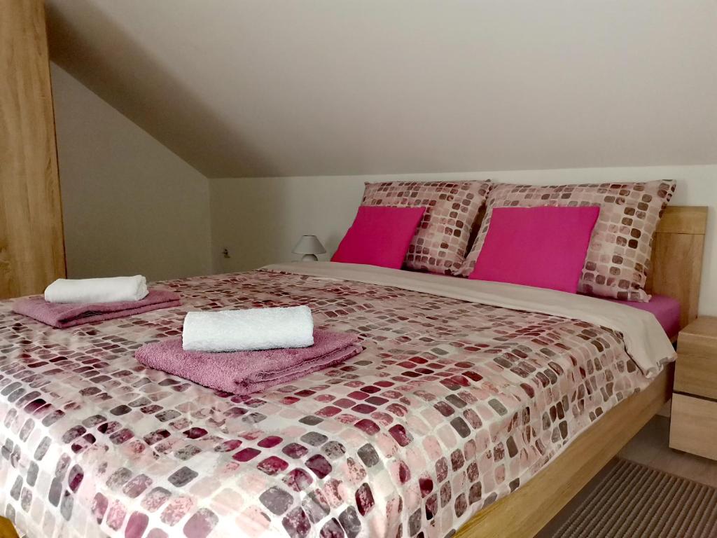 Posteľ alebo postele v izbe v ubytovaní Apartmani "Marina"