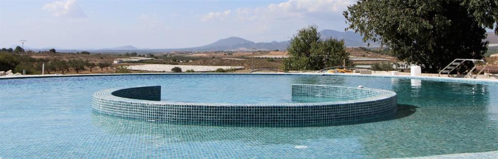 Bazén v ubytování HOTEL MIRADOR DE ALEDO nebo v jeho okolí
