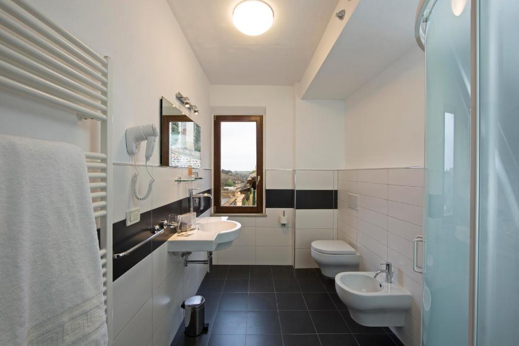 Koupelna v ubytování Hotel Alma Domus