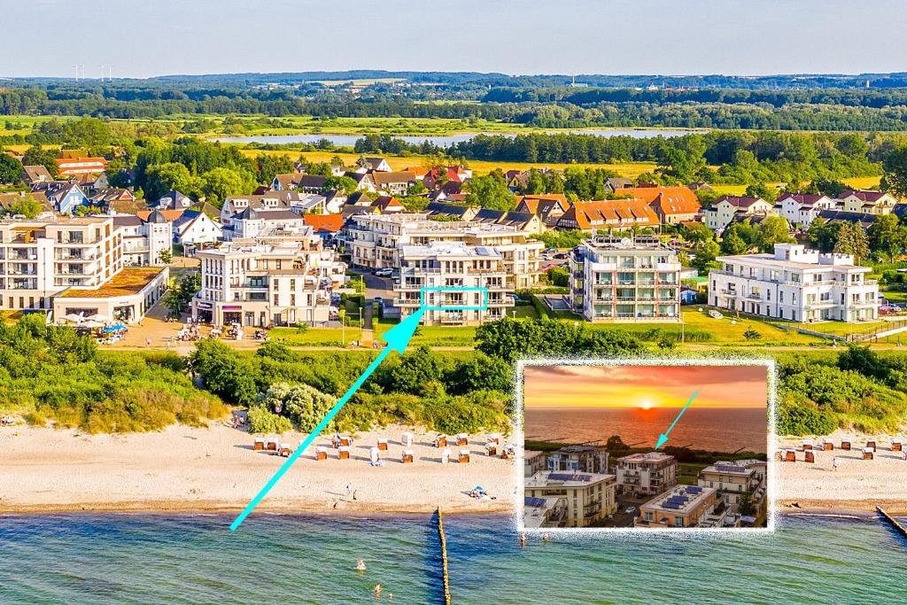 an aerial view of a beach in front of condos at Villa Deichgraf 7 "Ostseeblick" in Börgerende-Rethwisch