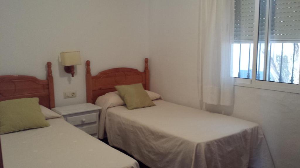 A bed or beds in a room at Casas Isabel