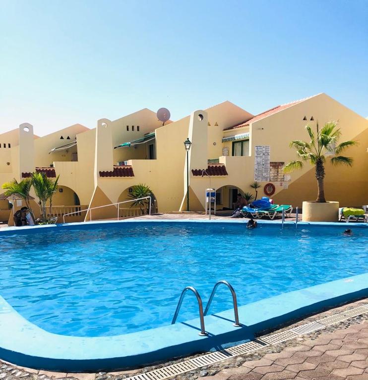 Bazén v ubytování Amazing holidays in Tenerife with wifi nebo v jeho okolí