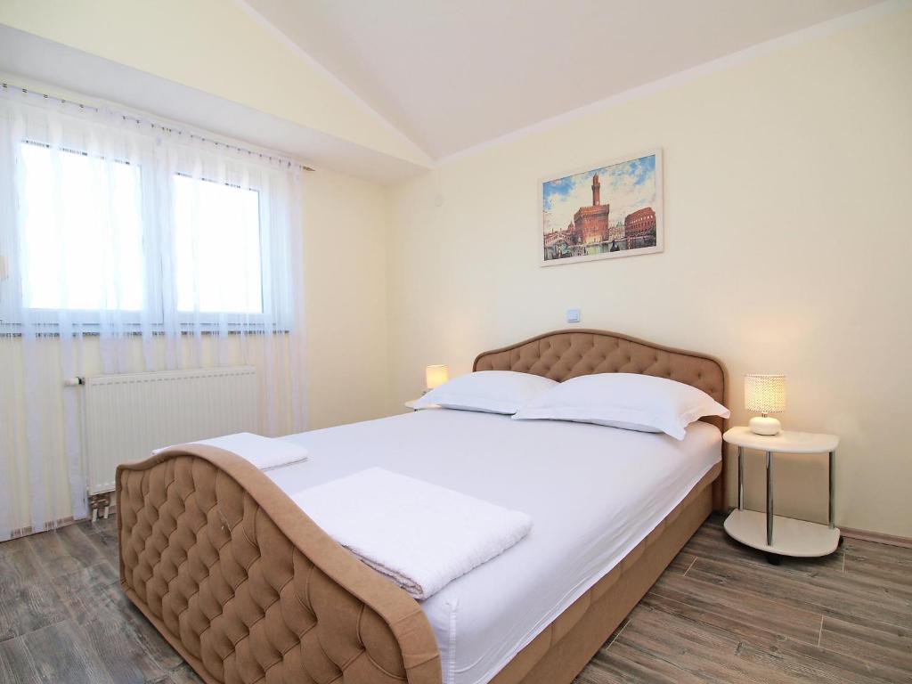 Posteľ alebo postele v izbe v ubytovaní Apartment Marko-1 by Interhome