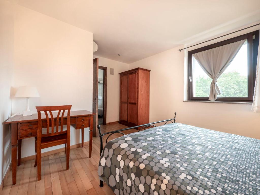 Posteľ alebo postele v izbe v ubytovaní Holiday Home Domus Magna-4 by Interhome