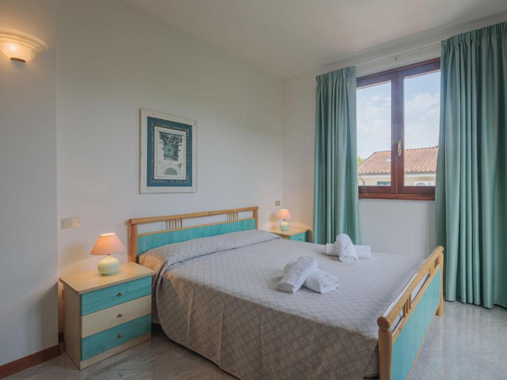 Posteľ alebo postele v izbe v ubytovaní Holiday Home Rosa by Interhome