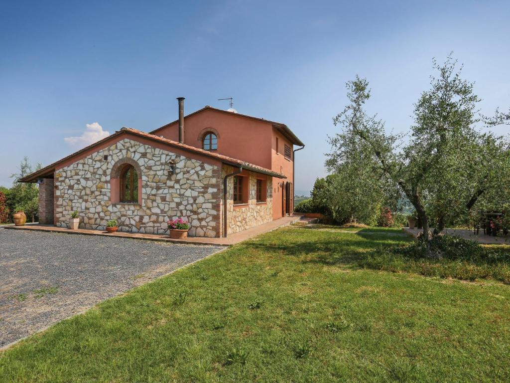 an old stone house with a large yard at Holiday Home La Beccaccia by Interhome in Canneto