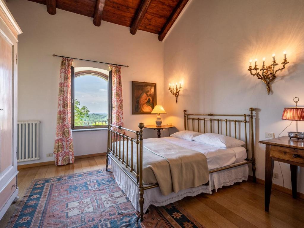 Łóżko lub łóżka w pokoju w obiekcie Villa Bric del Vento by Interhome