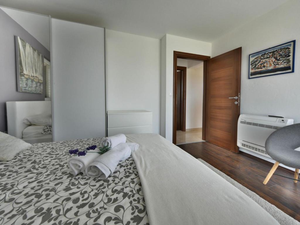 Posteľ alebo postele v izbe v ubytovaní Holiday Home Arbo by Interhome