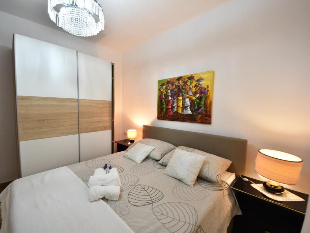 Posteľ alebo postele v izbe v ubytovaní Holiday Home Arbo by Interhome