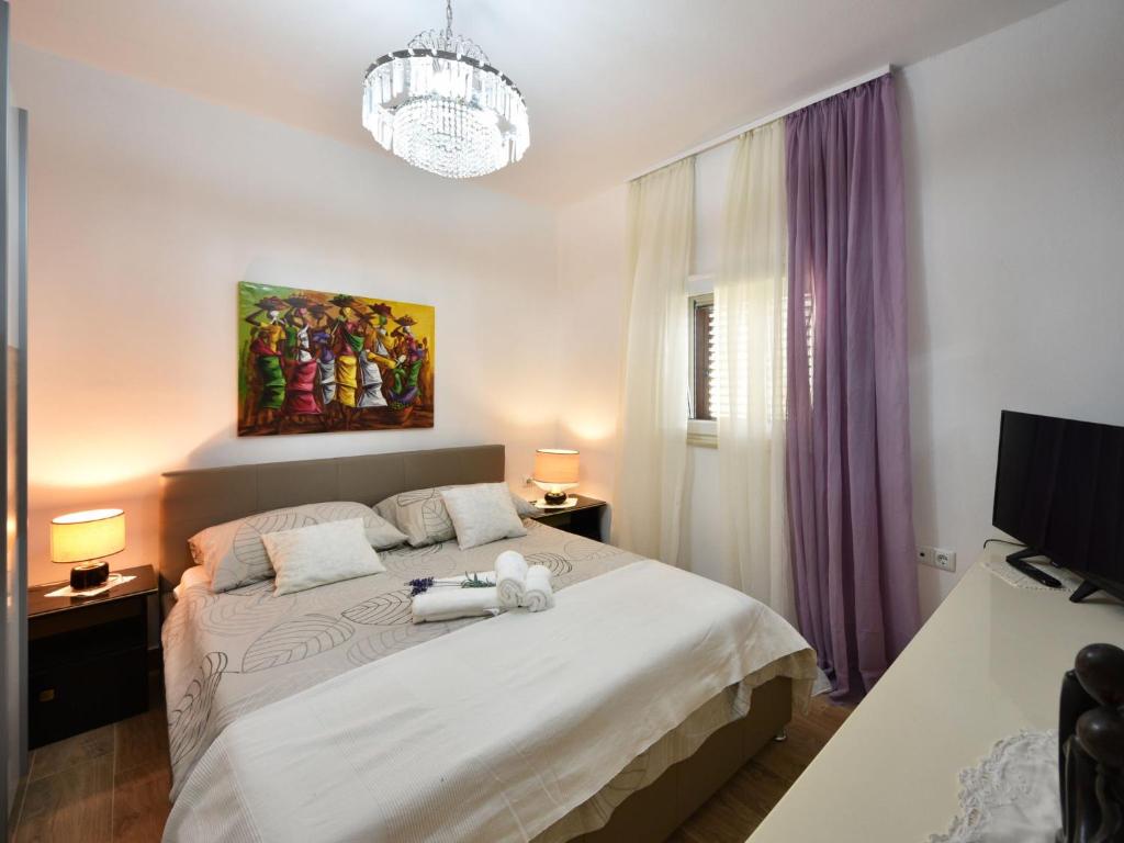Posteľ alebo postele v izbe v ubytovaní Holiday Home Arbo by Interhome