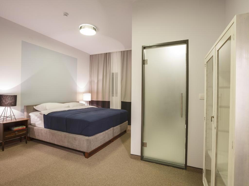 Voodi või voodid majutusasutuse Savamala b&b toas