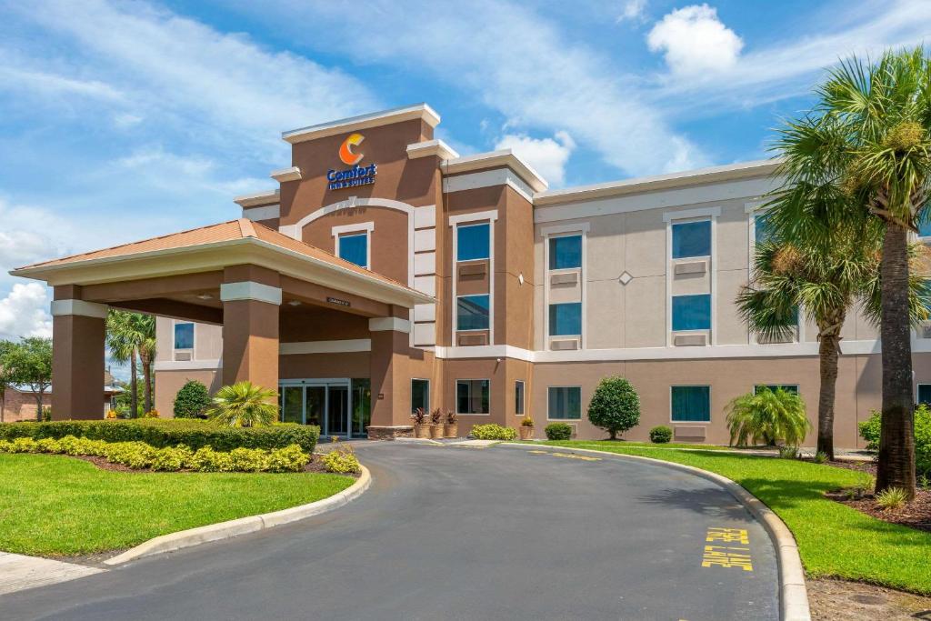 a hotel building with a road in front of it at Comfort Inn & Suites Wildwood - The Villages in Wildwood