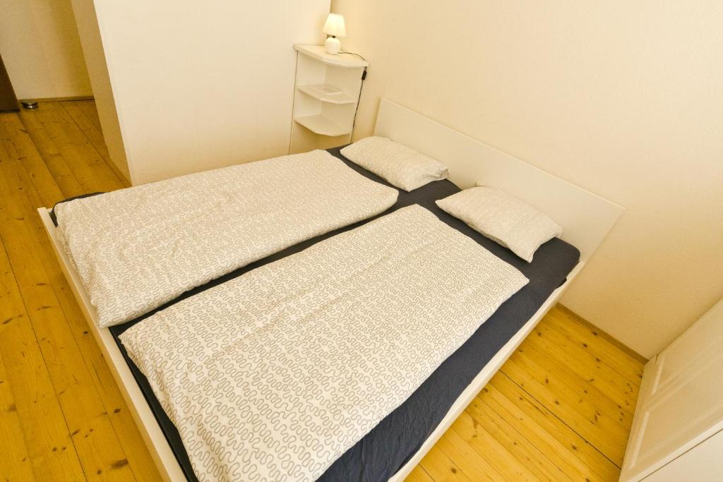 Posteľ alebo postele v izbe v ubytovaní Apartments in Vienna near Schönbrunn & Westbahnhof - Keyless Check-In