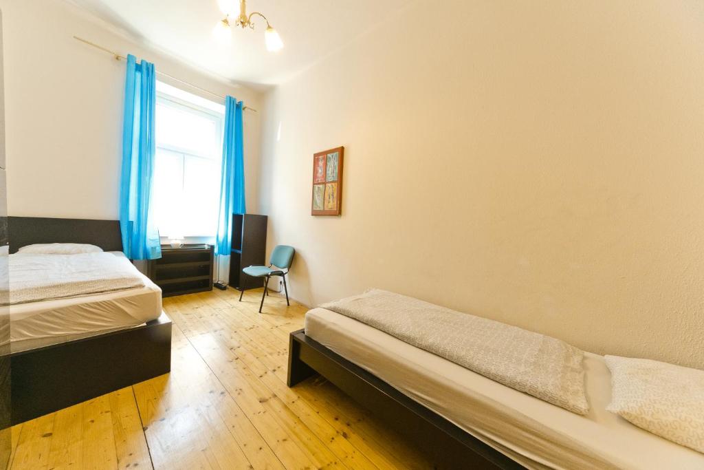 Posteľ alebo postele v izbe v ubytovaní Apartments in Vienna near Schönbrunn & Westbahnhof - Keyless Check-In