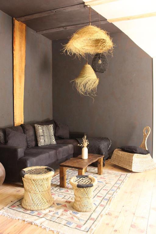 A seating area at Esencia Lodge - luxurious off-grid cabin retreat