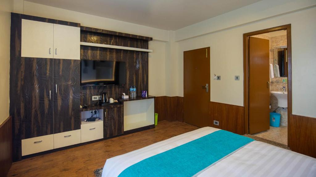 Kuchyň nebo kuchyňský kout v ubytování Hotel Himalayan Glacier