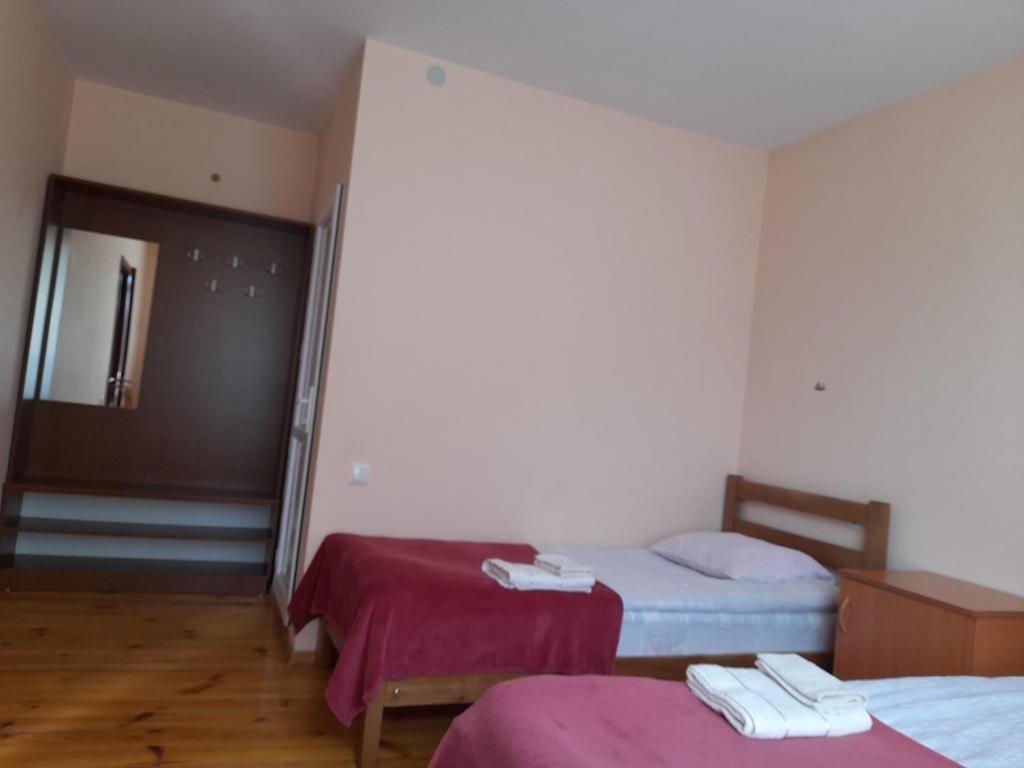 Postel nebo postele na pokoji v ubytování Kera Guest House