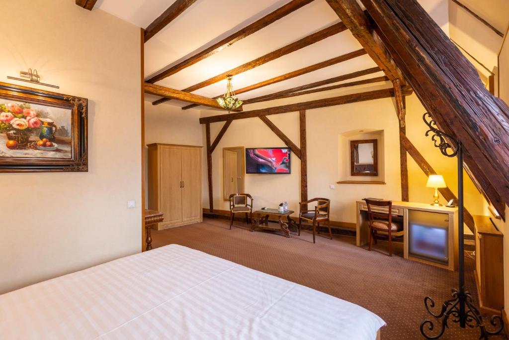 Postel nebo postele na pokoji v ubytování Hotel Am Ring