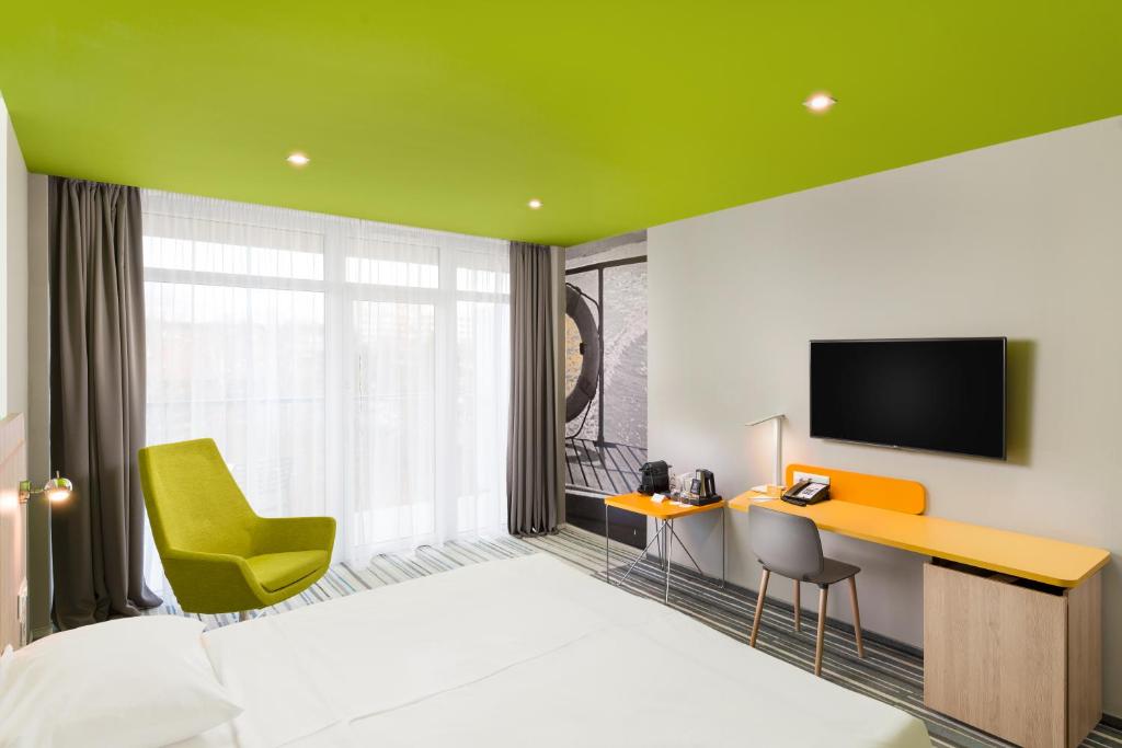 TV a/nebo společenská místnost v ubytování Park Inn By Radisson Zalakaros Hotel & Spa