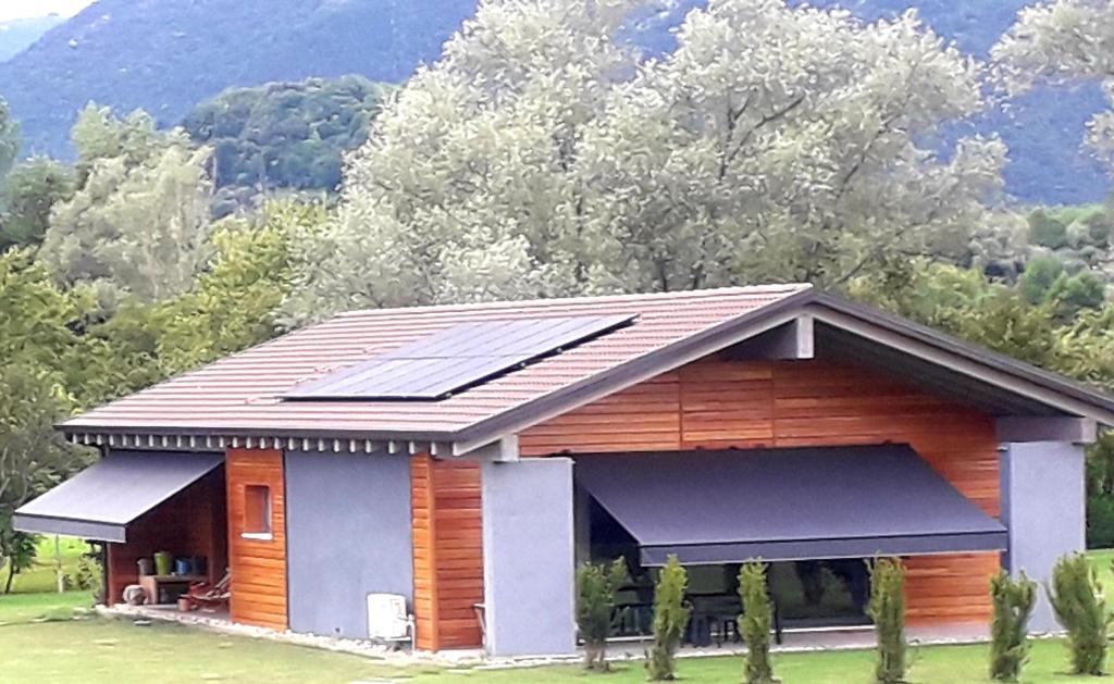 a house with solar panels on the roof at Casa Nicole 2 in Borso del Grappa
