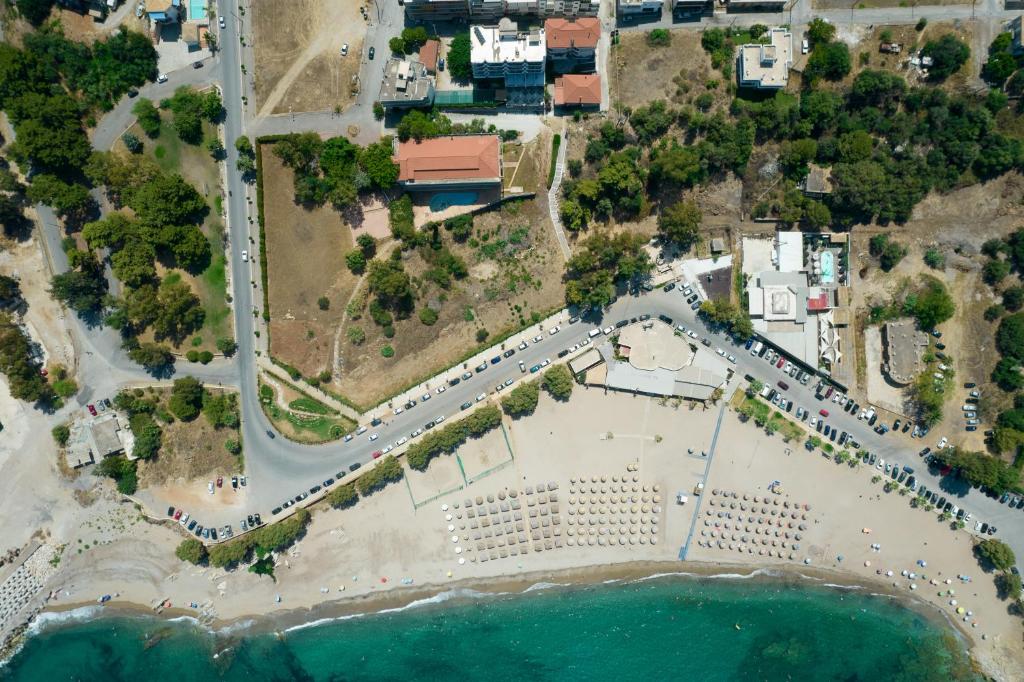 an aerial view of a beach with a resort at Elegant Beach Hotel - former Hotel Tsolaridis in Kyparissia