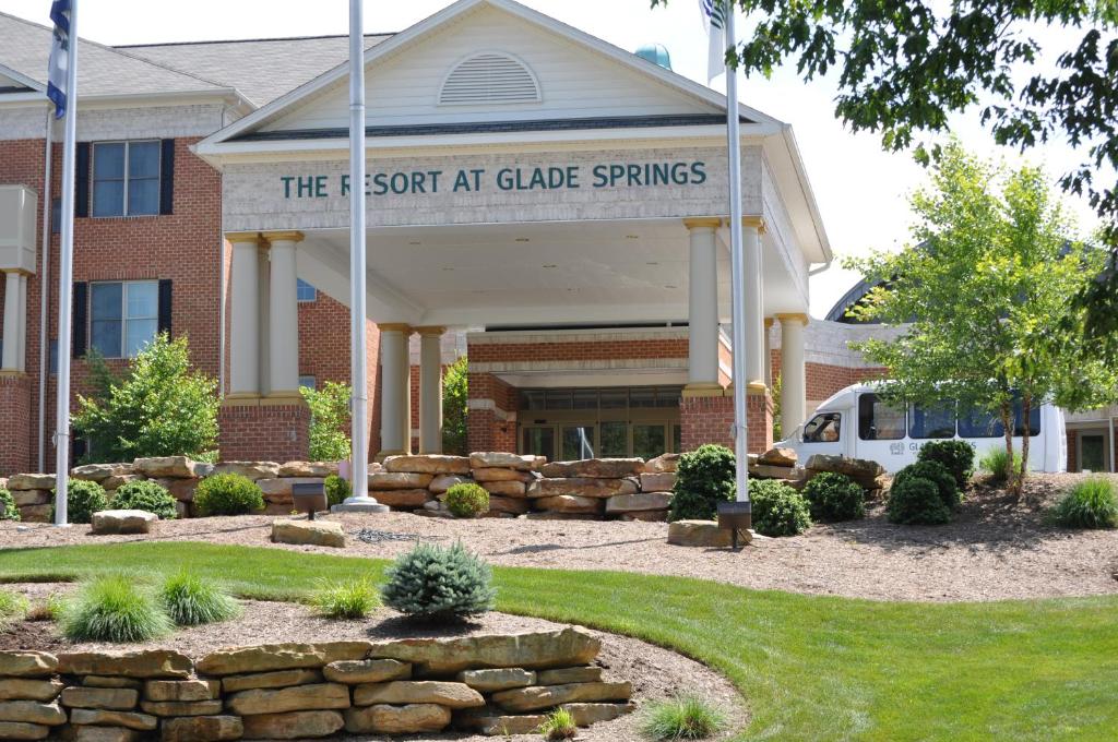 a building with a sign on the front of it at The Resort at Glade Springs in Daniels