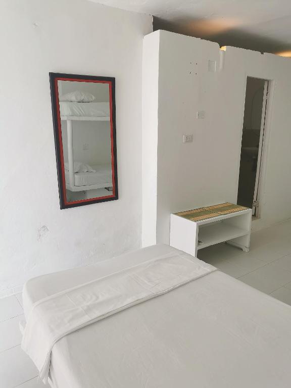 Postel nebo postele na pokoji v ubytování Casa el Muelle