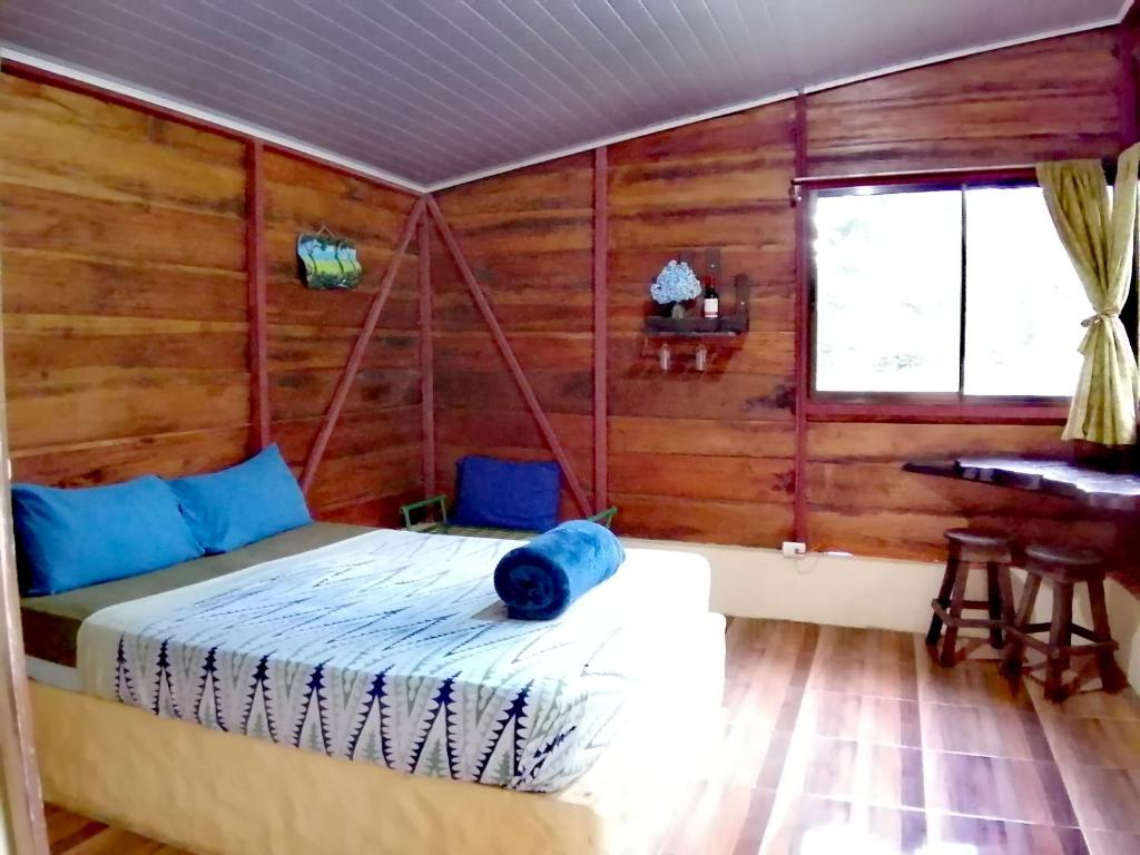 Postel nebo postele na pokoji v ubytování Cecropia Ecolodge